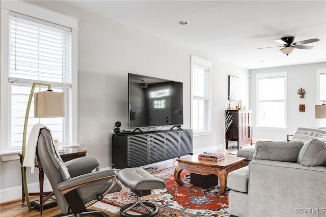 1207 N 21st St, Richmond, VA 23223 - living area with baseboards, ceiling fan, and wood finished floors