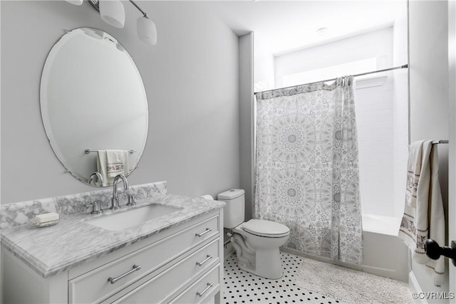 1207 N 21st St, Richmond, VA 23223 - full bath with vanity, tile patterned floors, toilet, and shower / tub combo