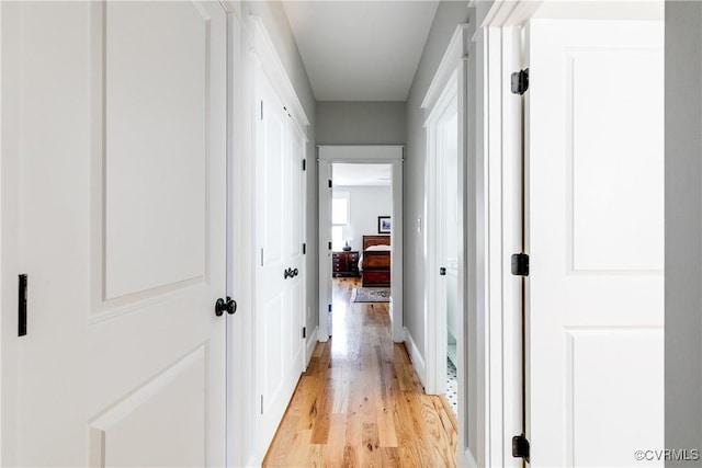 1207 N 21st St, Richmond, VA 23223 - corridor with light wood-style floors and baseboards