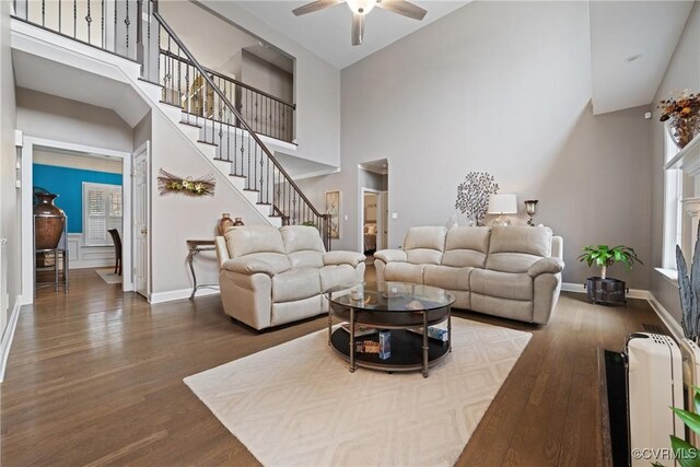 7324 Rosemead Ln, Chesterfield, VA 23838 - living area with stairs, a towering ceiling, wood finished floors, baseboards, and a ceiling fan