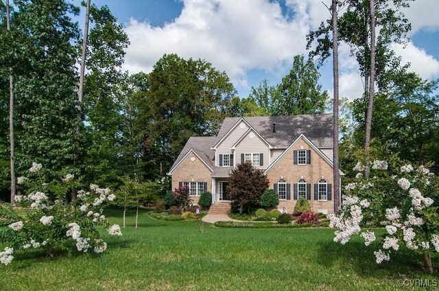 7324 Rosemead Ln, Chesterfield, VA 23838 - view of front facade with a front lawn and brick siding