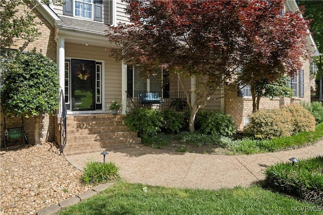 7324 Rosemead Ln, Chesterfield, VA 23838 - doorway to property with brick siding and a porch