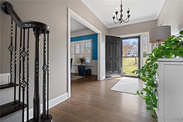 7324 Rosemead Ln, Chesterfield, VA 23838 - foyer with an inviting chandelier, ornamental molding, wainscoting, and wood finished floors