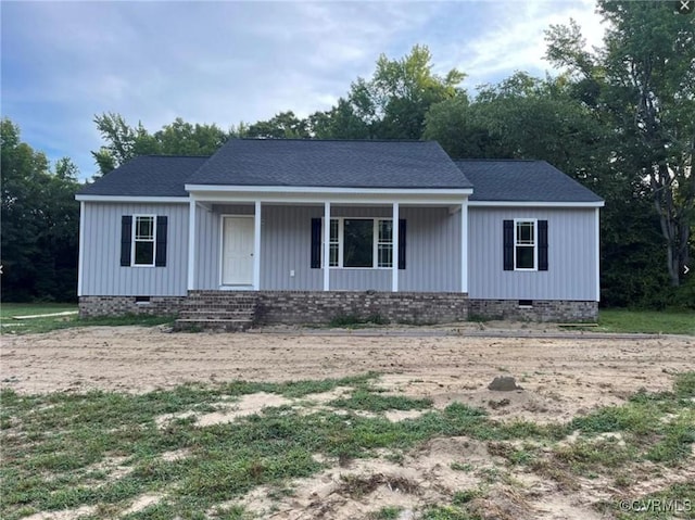 100 W St Johns Church Rd, West Point, VA 23181 - view of front facade featuring a porch, crawl space, and roof with shingles