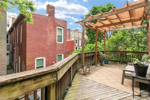wooden terrace featuring a pergola
