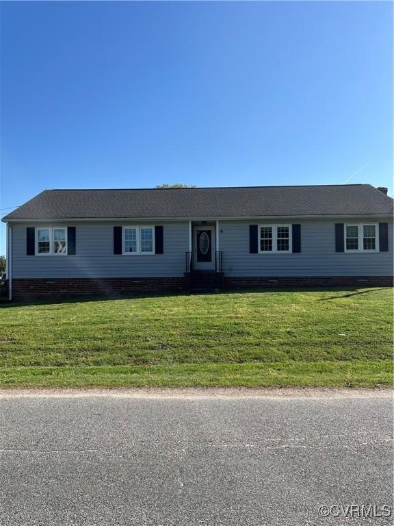 single story home featuring crawl space and a front yard