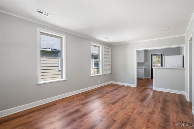 1207 Edgewood Blvd, Hopewell, VA 23860 - unfurnished room featuring visible vents, ornamental molding, and dark wood-style flooring