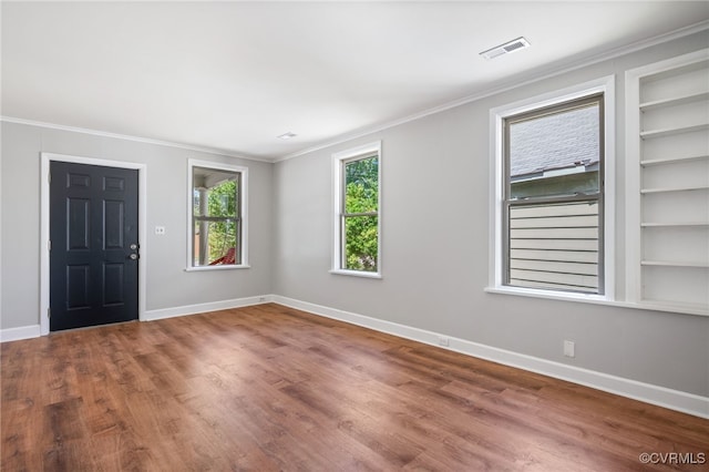 1207 Edgewood Blvd, Hopewell, VA 23860 - entryway featuring baseboards, visible vents, ornamental molding, and wood finished floors
