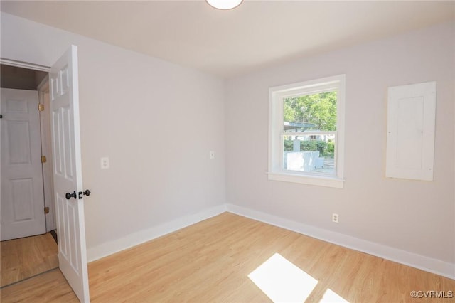 2014 Dinwiddie Ave, Richmond, VA 23224 - empty room featuring light wood finished floors and electric panel