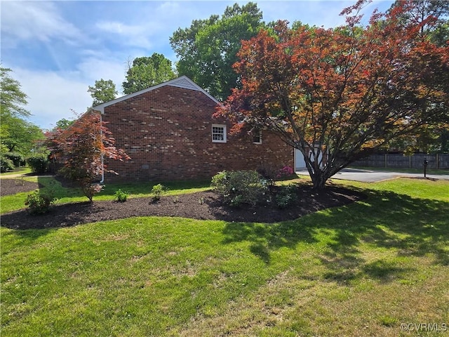 8600 Chester Forest Ln, North Chesterfield, VA 23237 - view of property exterior with a lawn, fence, and brick siding