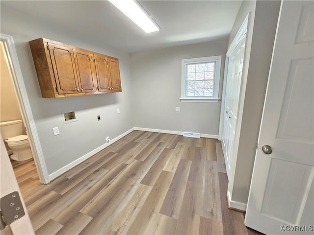 8600 Chester Forest Ln, North Chesterfield, VA 23237 - washroom featuring wood finished floors, hookup for a washing machine, hookup for an electric dryer, cabinet space, and hookup for a gas dryer