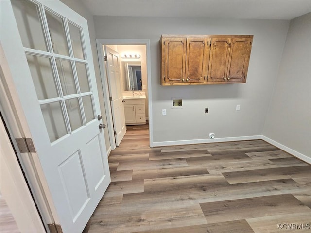 8600 Chester Forest Ln, North Chesterfield, VA 23237 - laundry room with cabinet space, a sink, hookup for a washing machine, electric dryer hookup, and wood finished floors
