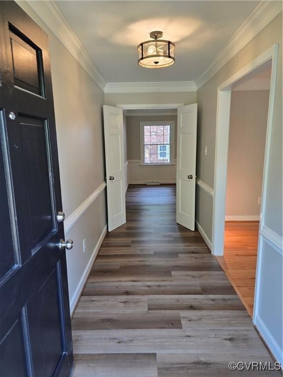 8600 Chester Forest Ln, North Chesterfield, VA 23237 - corridor with crown molding and wood finished floors