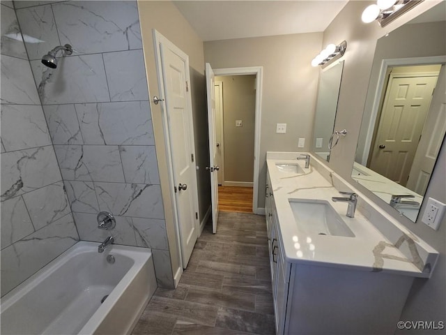 8600 Chester Forest Ln, North Chesterfield, VA 23237 - bathroom featuring double vanity, baseboards, shower / tub combination, and a sink