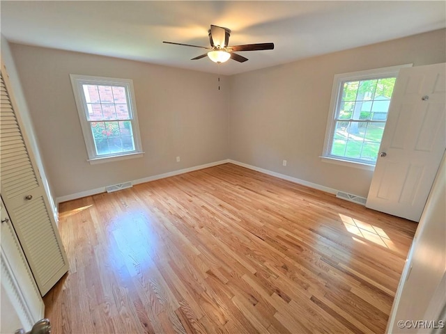 8600 Chester Forest Ln, North Chesterfield, VA 23237 - unfurnished bedroom featuring baseboards, visible vents, ceiling fan, and light wood-type flooring