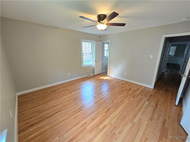 8600 Chester Forest Ln, North Chesterfield, VA 23237 - unfurnished room featuring baseboards, light wood finished floors, and ceiling fan