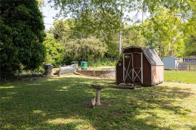 3006 Douglasdale Rd, Richmond, VA 23221 - view of yard with an outdoor structure, fence, and a shed