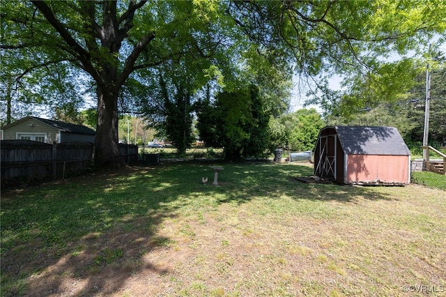 3006 Douglasdale Rd, Richmond, VA 23221 - view of yard with a storage shed, fence, and an outbuilding