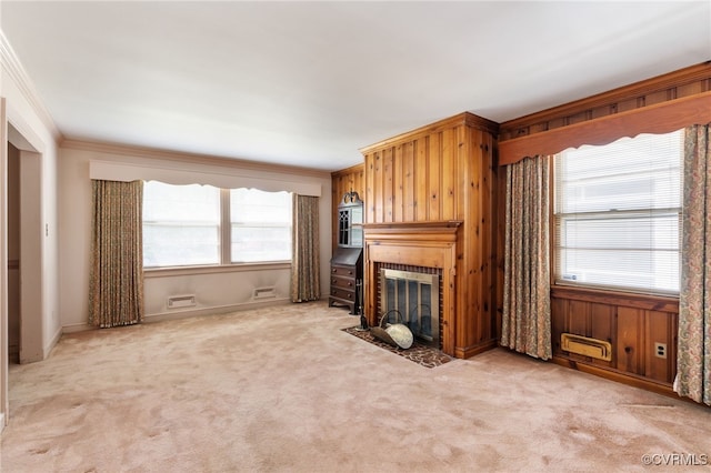 3006 Douglasdale Rd, Richmond, VA 23221 - unfurnished living room featuring light colored carpet, baseboards, a fireplace with flush hearth, and ornamental molding