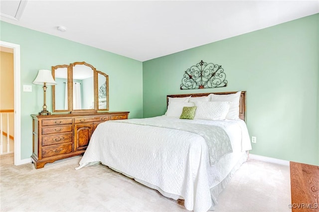 bedroom featuring carpet floors and baseboards