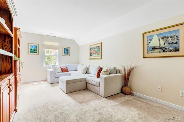 living room with baseboards, carpet, and vaulted ceiling
