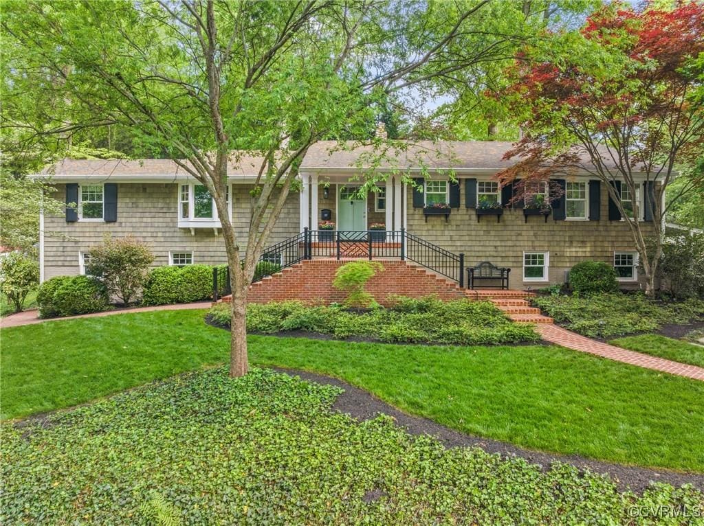 307 Charmian Rd, Richmond, VA 23226 - ranch-style home featuring a front lawn and stairway