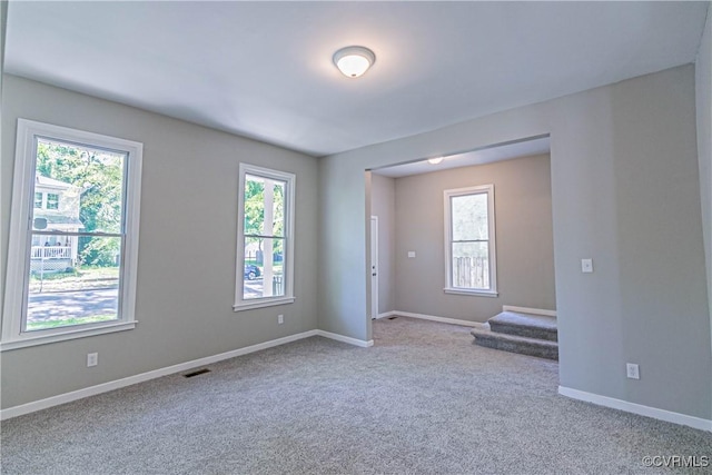 2008 2nd Ave, Richmond, VA 23222 - unfurnished room featuring carpet floors, visible vents, and a healthy amount of sunlight