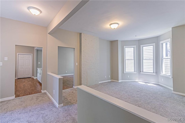 2008 2nd Ave, Richmond, VA 23222 - spare room with baseboards and dark colored carpet