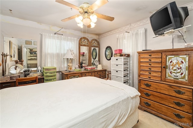 bedroom featuring carpet floors and a ceiling fan