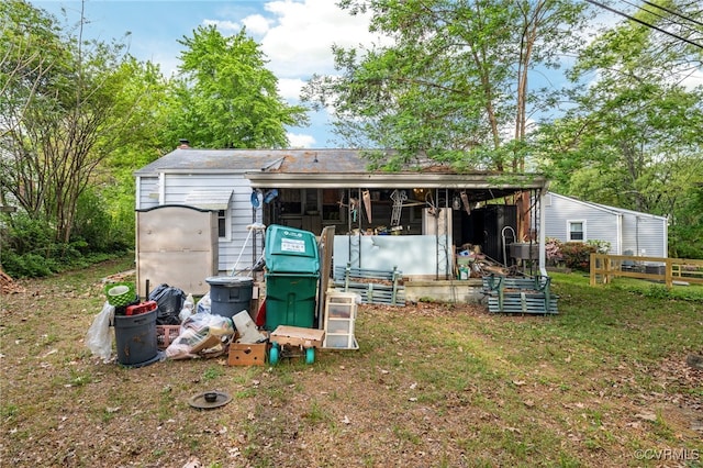 back of property with fence