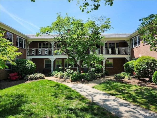 4018 Forest Hill Ave Unit U7, Richmond, VA 23225 - view of front of home with a front lawn, brick siding, and a balcony