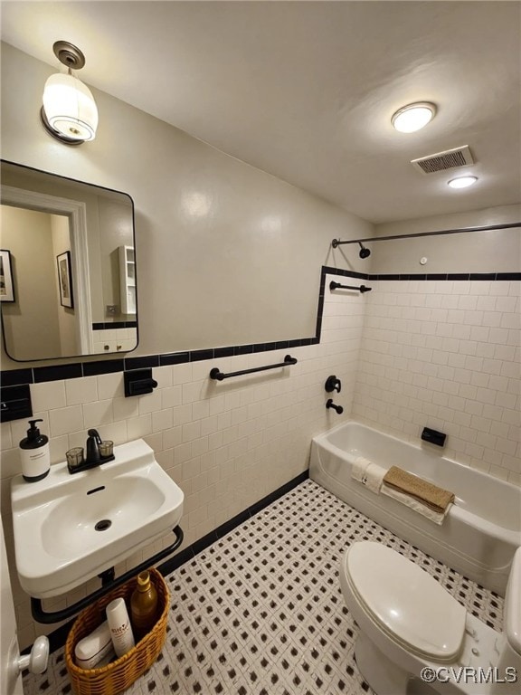 4018 Forest Hill Ave Unit U7, Richmond, VA 23225 - full bath with tile walls, a sink, toilet, shower / tub combination, and a wainscoted wall