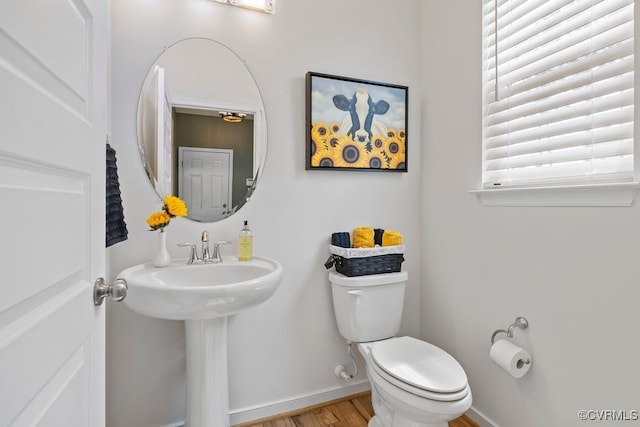 15501 Wolfboro Rd, Chesterfield, VA 23832 - half bath featuring a sink, baseboards, toilet, and wood finished floors