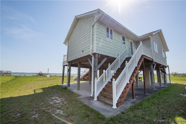 2000 Jenkins Neck Rd, Hayes, VA 23072 - exterior space featuring a yard, a water view, and a patio area