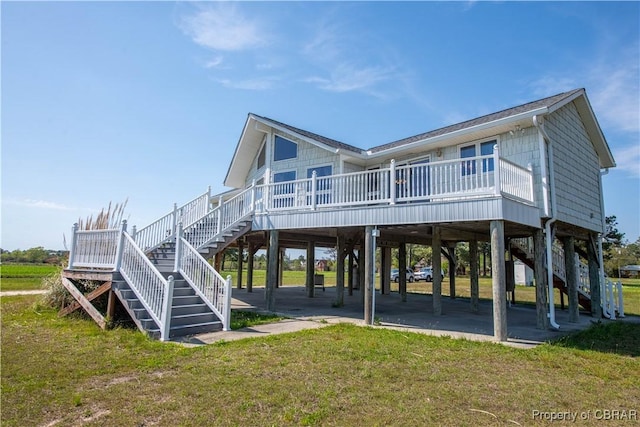 2000 Jenkins Neck Rd, Hayes, VA 23072 - rear view of house featuring a yard, a carport, and stairs