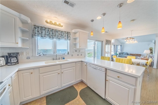 2000 Jenkins Neck Rd, Hayes, VA 23072 - kitchen with visible vents, white dishwasher, open shelves, and a sink