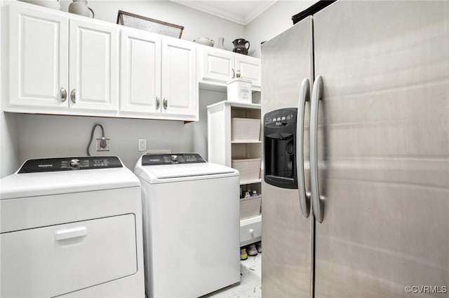 20145 Hunnicut Rd, Dinwiddie, VA 23803 - laundry area featuring ornamental molding, cabinet space, and washing machine and dryer