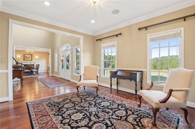20145 Hunnicut Rd, Dinwiddie, VA 23803 - sitting room featuring an inviting chandelier, ornamental molding, baseboards, and wood finished floors