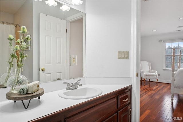 20145 Hunnicut Rd, Dinwiddie, VA 23803 - full bathroom featuring recessed lighting, vanity, hardwood / wood-style flooring, and visible vents