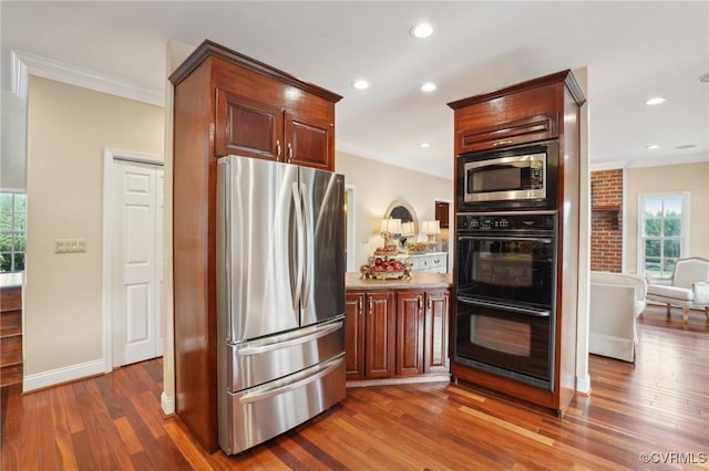 20145 Hunnicut Rd, Dinwiddie, VA 23803 - kitchen with ornamental molding, stainless steel appliances, and a wealth of natural light