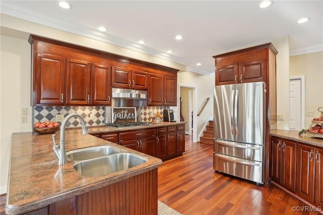 20145 Hunnicut Rd, Dinwiddie, VA 23803 - kitchen with dark wood-style flooring, a sink, stainless steel appliances, a peninsula, and under cabinet range hood