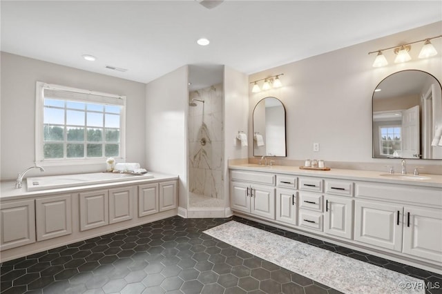 20145 Hunnicut Rd, Dinwiddie, VA 23803 - full bathroom with double vanity, a sink, a bath, and tiled shower