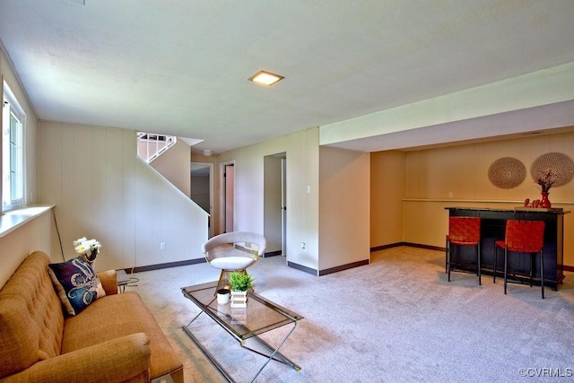 1423 Bull Run Dr, Henrico, VA 23231 - carpeted living room with baseboards, a bar, and stairs