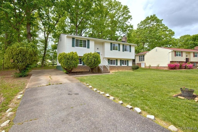 1423 Bull Run Dr, Henrico, VA 23231 - bi-level home featuring a front lawn, driveway, and a chimney