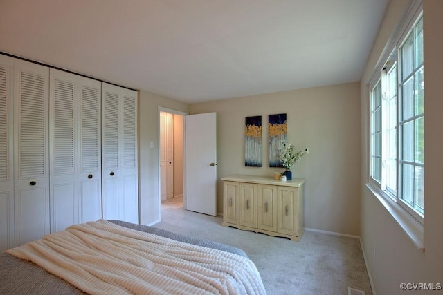 1423 Bull Run Dr, Henrico, VA 23231 - bedroom with baseboards, light carpet, and a closet