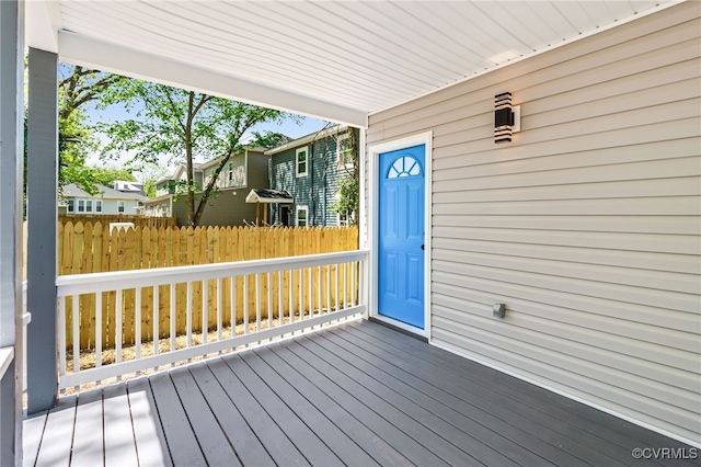 wooden deck featuring fence