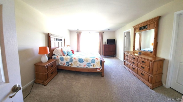 8133 Belton Cir, Mechanicsville, VA 23116 - bedroom featuring light carpet and baseboards