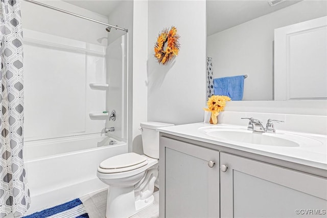 full bathroom featuring vanity, toilet, and shower / tub combo with curtain