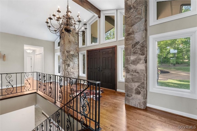 3640 Michaux Mill Dr, Powhatan, VA 23139 - entryway with a chandelier, wood finished floors, baseboards, high vaulted ceiling, and beamed ceiling