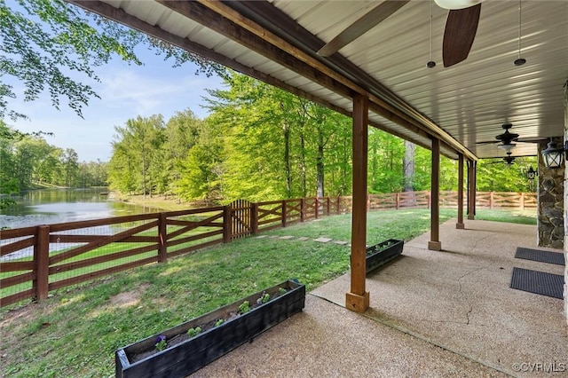 3640 Michaux Mill Dr, Powhatan, VA 23139 - view of patio featuring a water view, a ceiling fan, and a wooded view